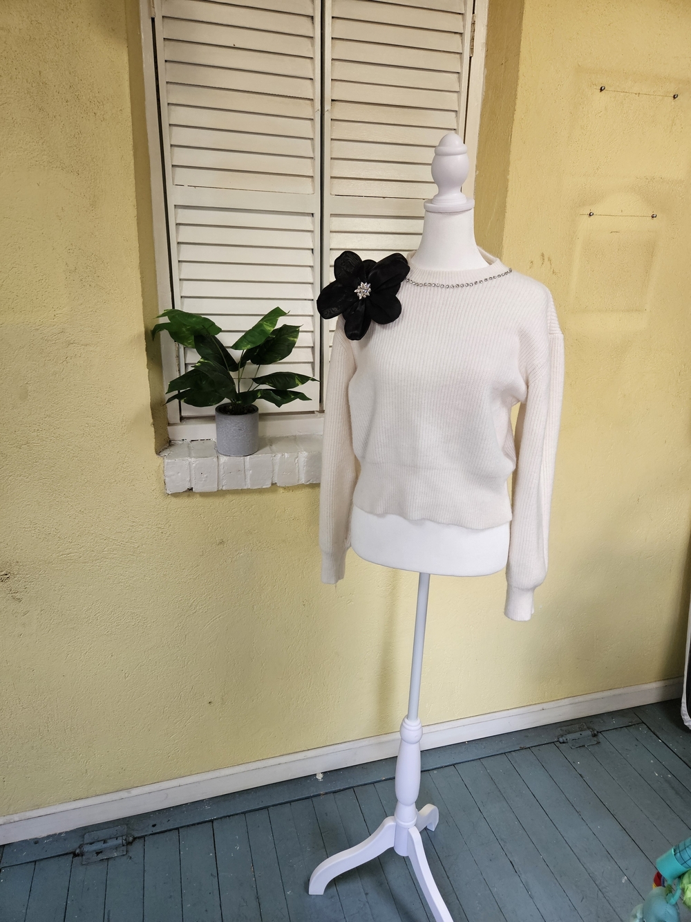 Cream Ribbed Crewneck Sweater with Black Floral Shoulder Accent